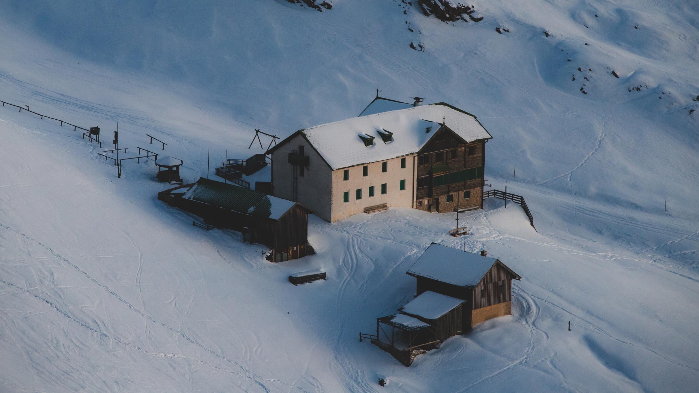 old wodden house in the southtyorlian alps in winter surrounded by snow